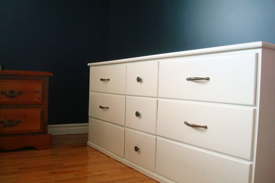 White dresser with brass hardware after