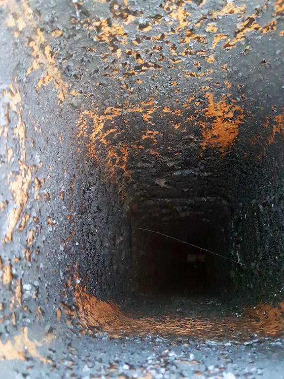 Soot on the inside of the chimney flue