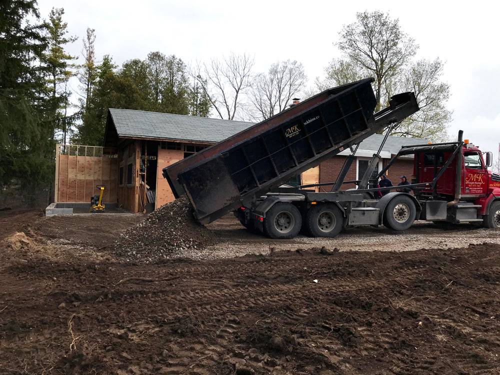 Truck dumping gravel